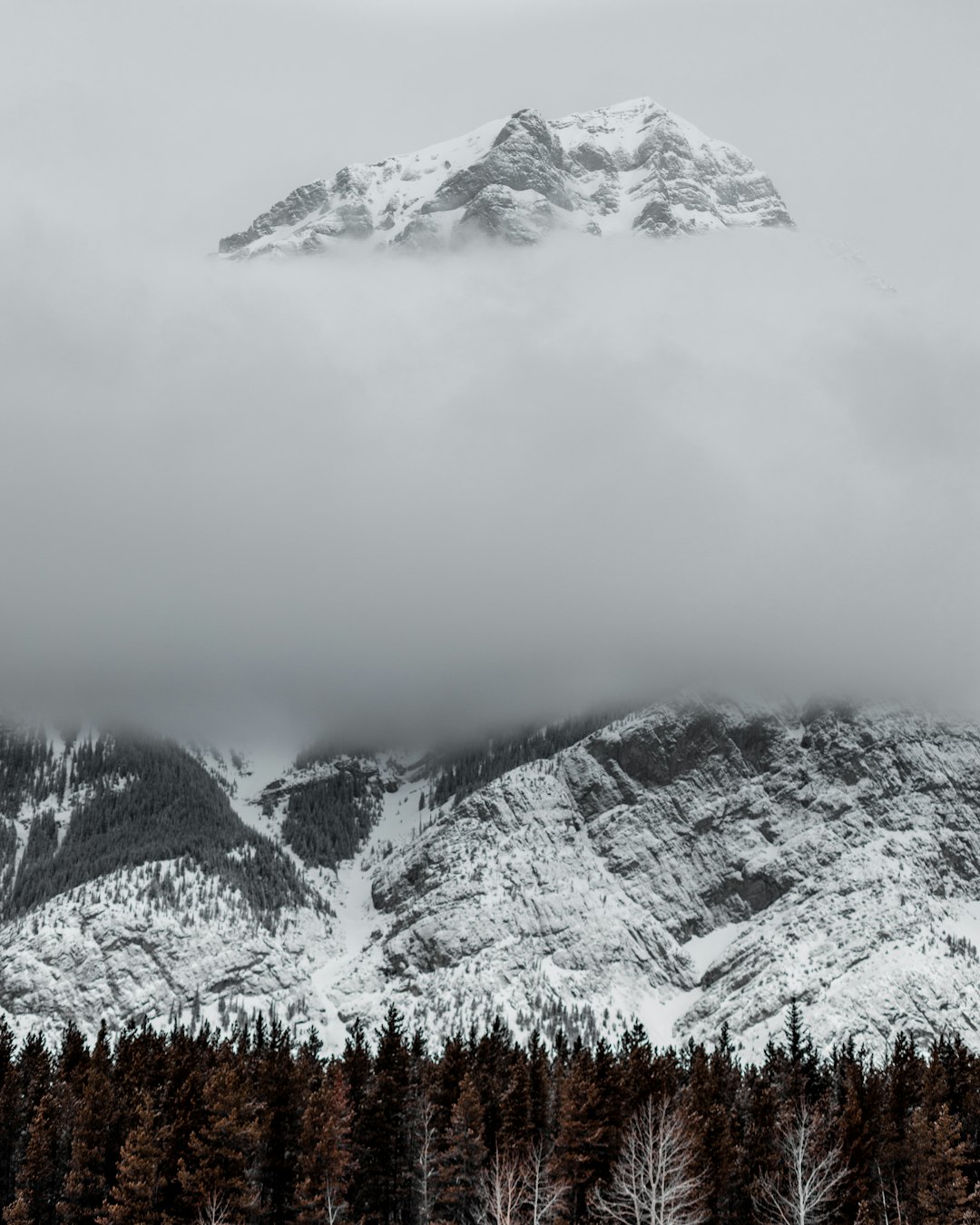 snow covered mountain during daytime