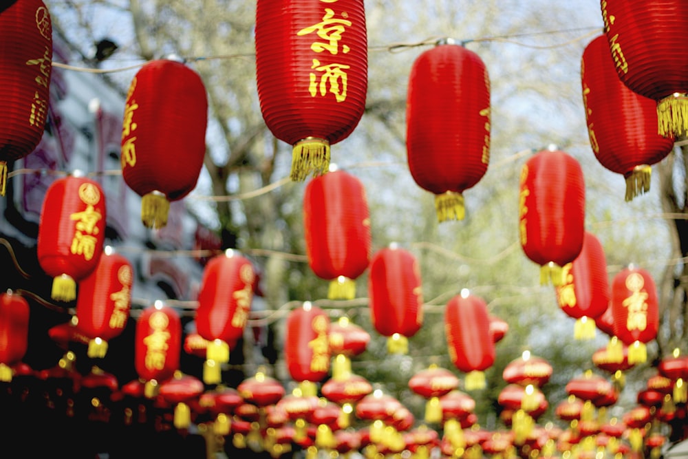 Happy Chinese new year banner, red and gold lantern lampion paper