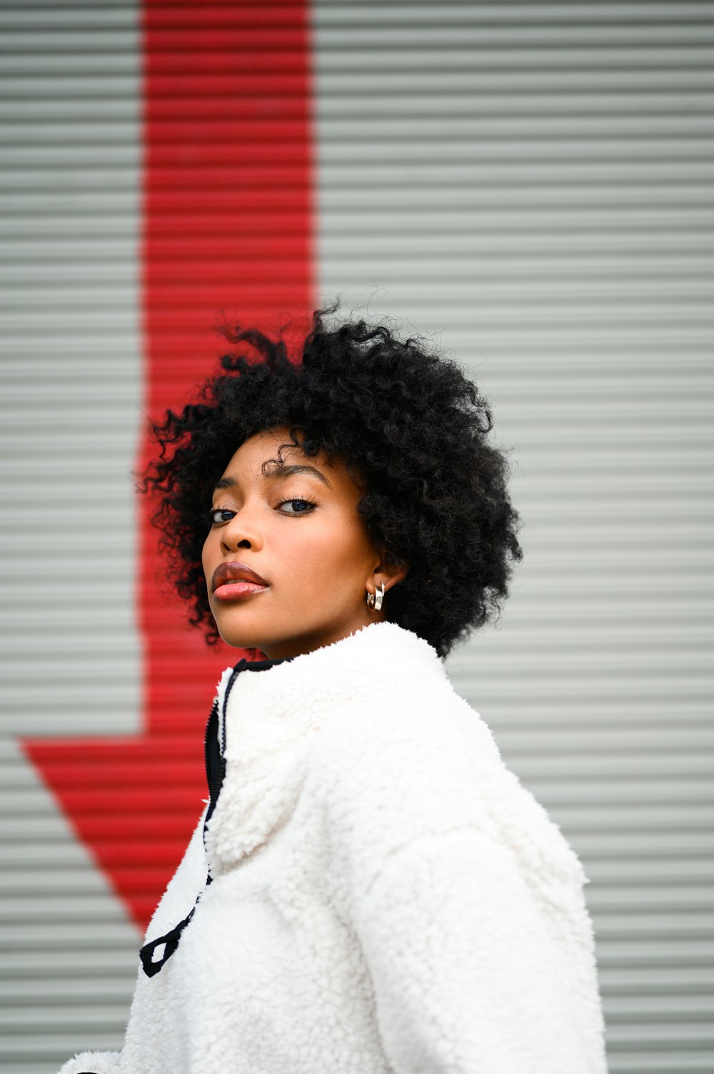 woman in white and red shirt