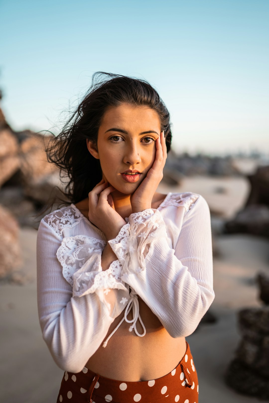 woman in white long sleeve shirt