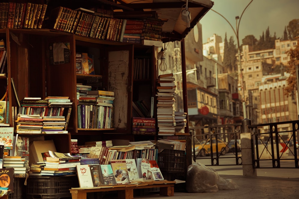 books on brown wooden shelf