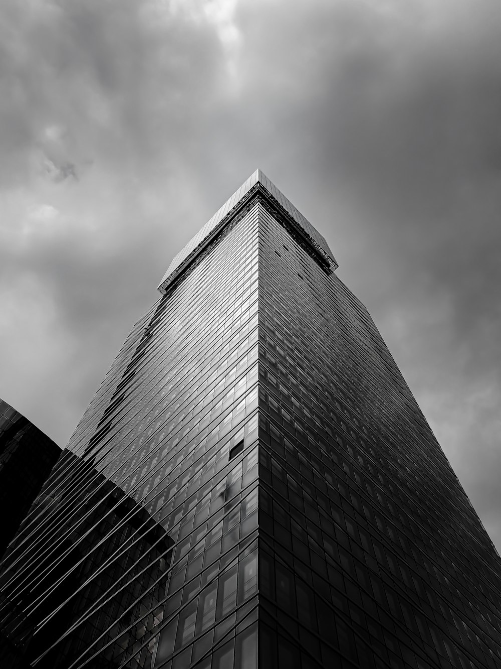 grayscale photo of high rise building