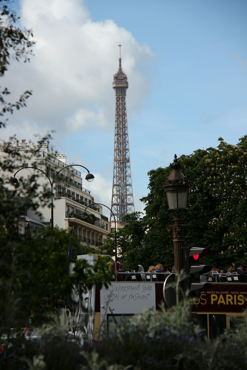 people walking on street near eiffel tower during daytime