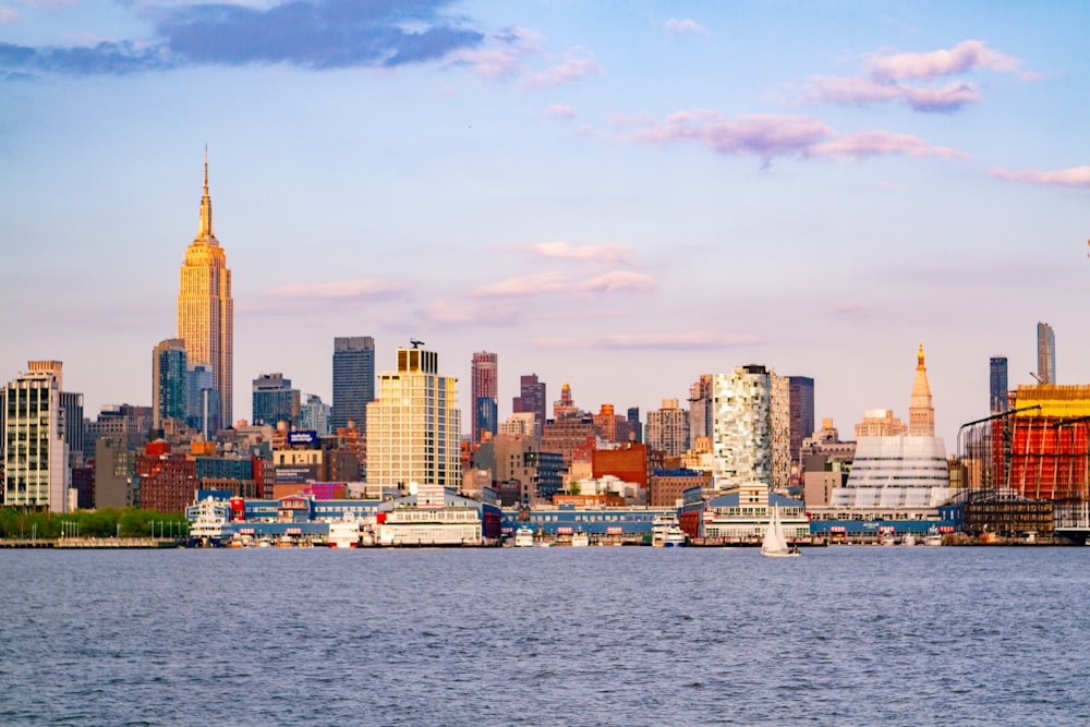 city skyline across body of water during daytime