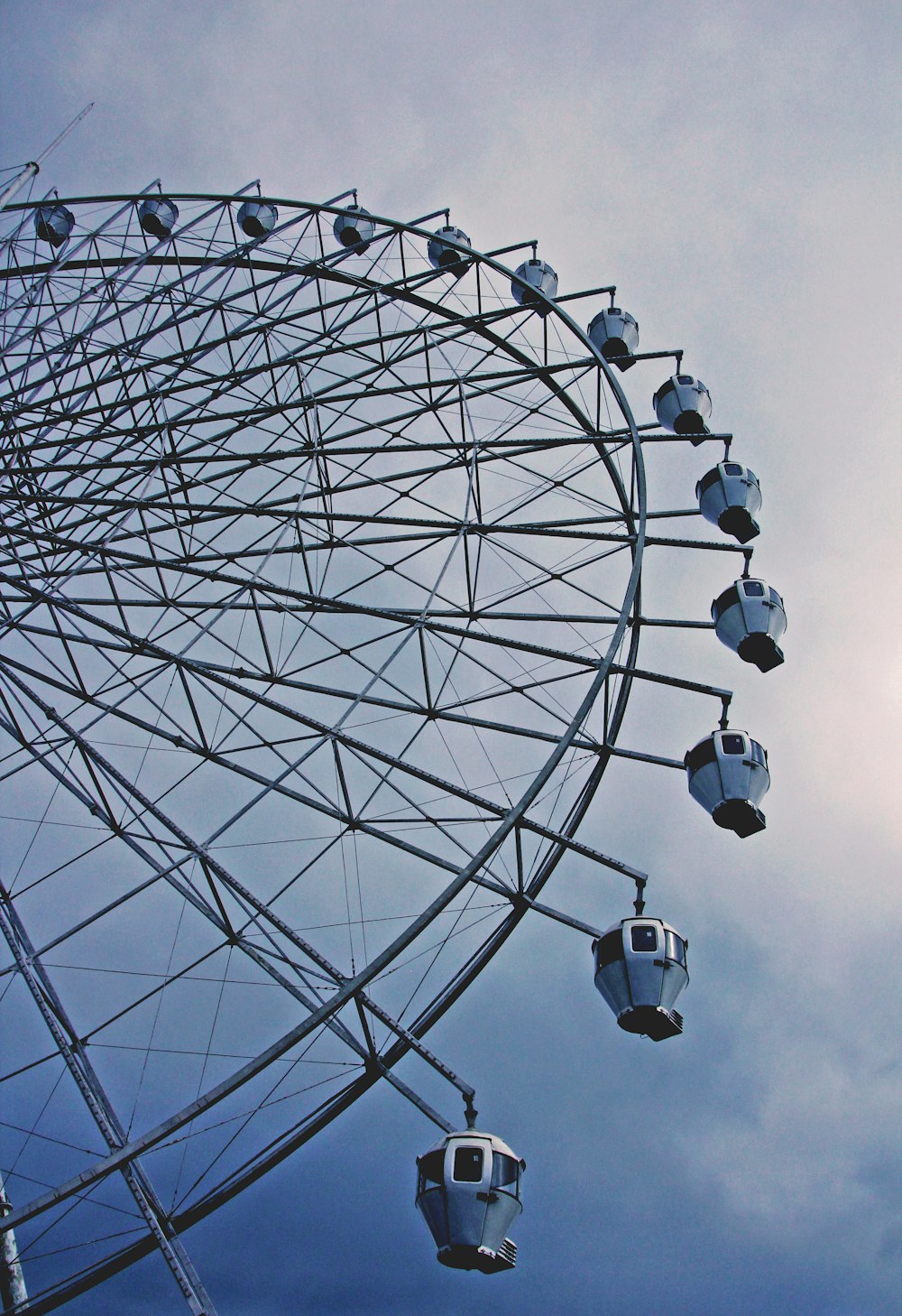 white ferris wheel under blue sky during daytime