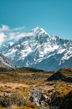 snow covered mountain under blue sky during daytime