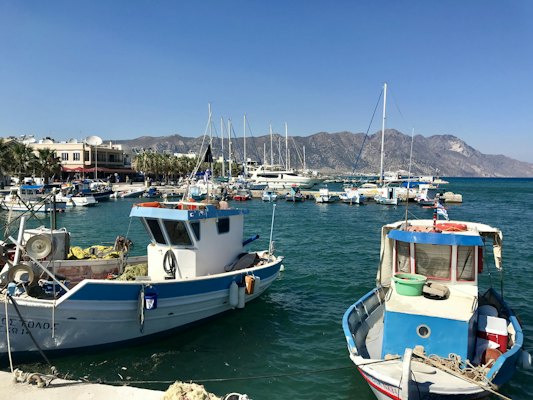 White and blue boat on sea during daytime — Kos, Greece