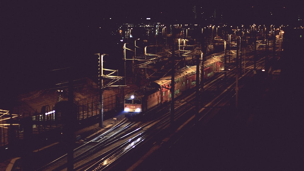 train on rail during night time