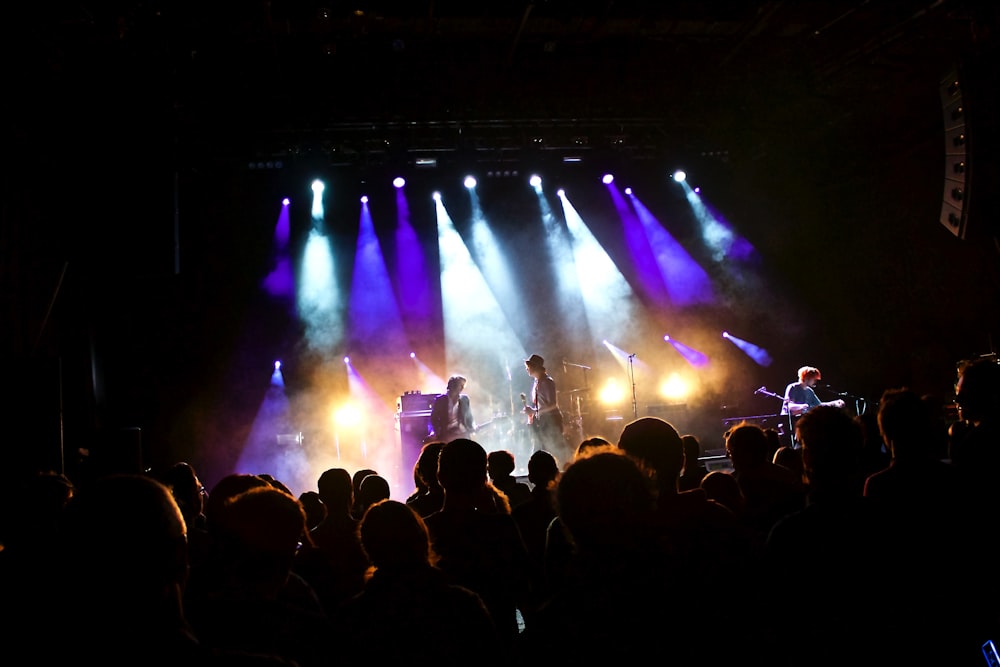 people watching concert during night time