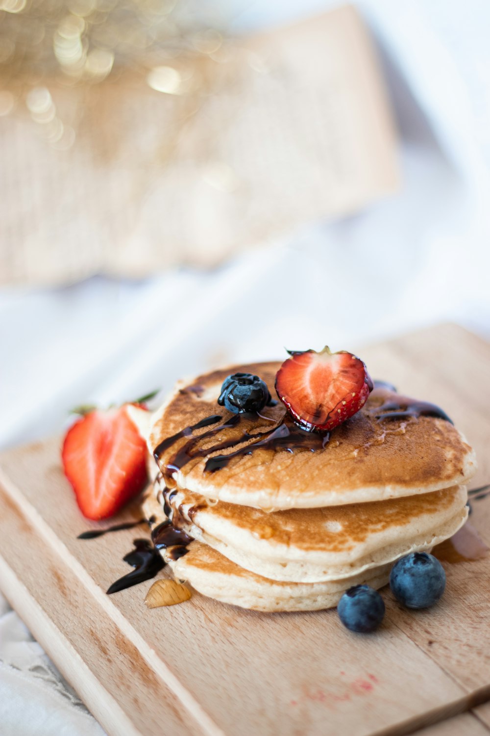 brown and white pastry with blue berries on top