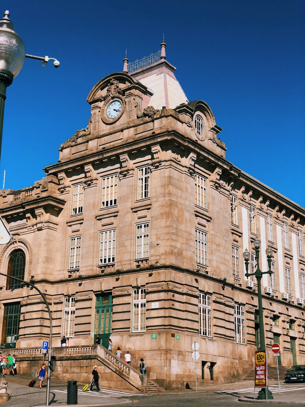 brown concrete building under blue sky during daytime