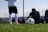 man in black t-shirt and white shorts playing soccer during daytime
