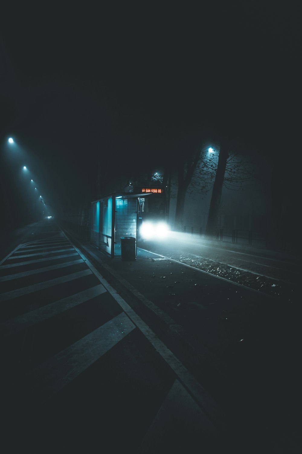 black and white photo of a train rail