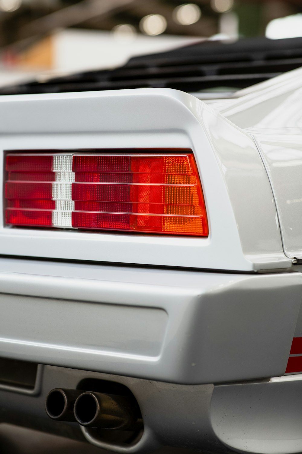 white car with red light