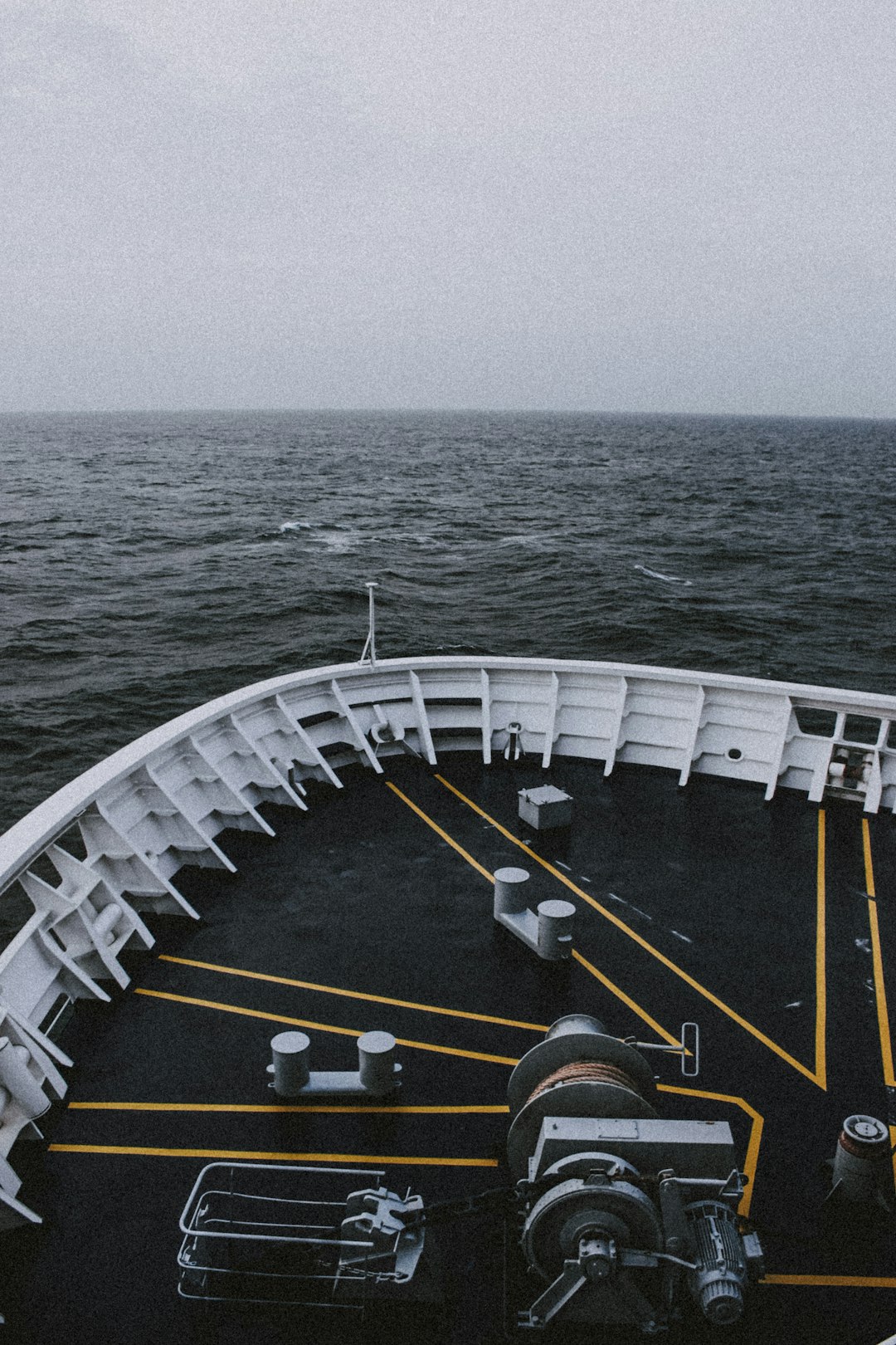 white ship on sea during daytime