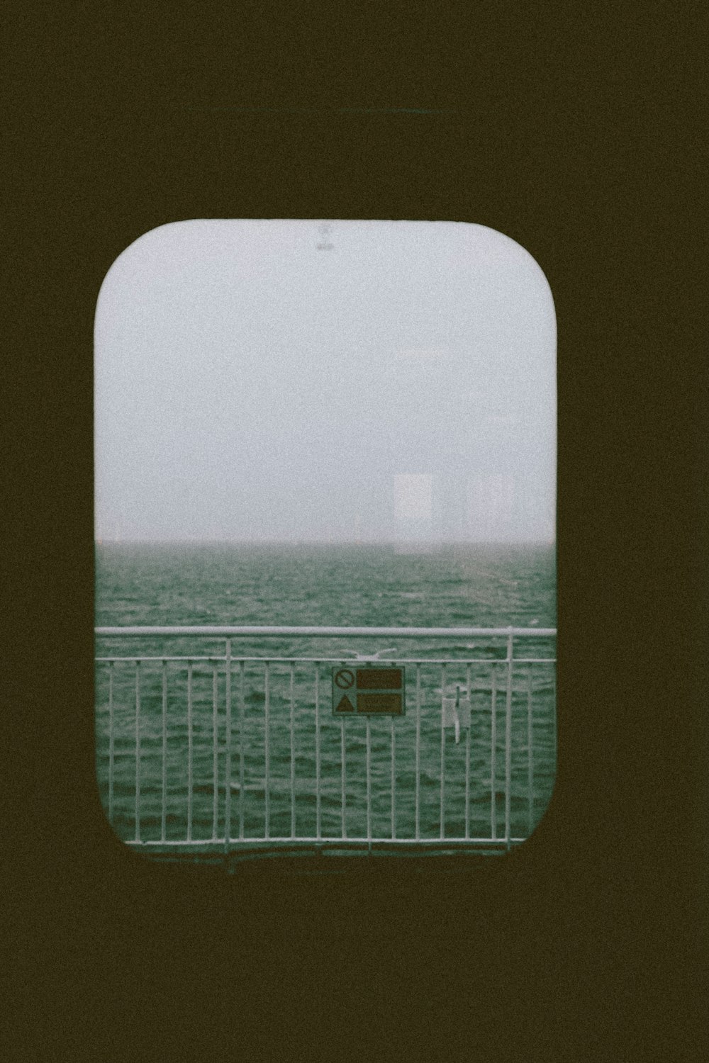 a view of the ocean through a window