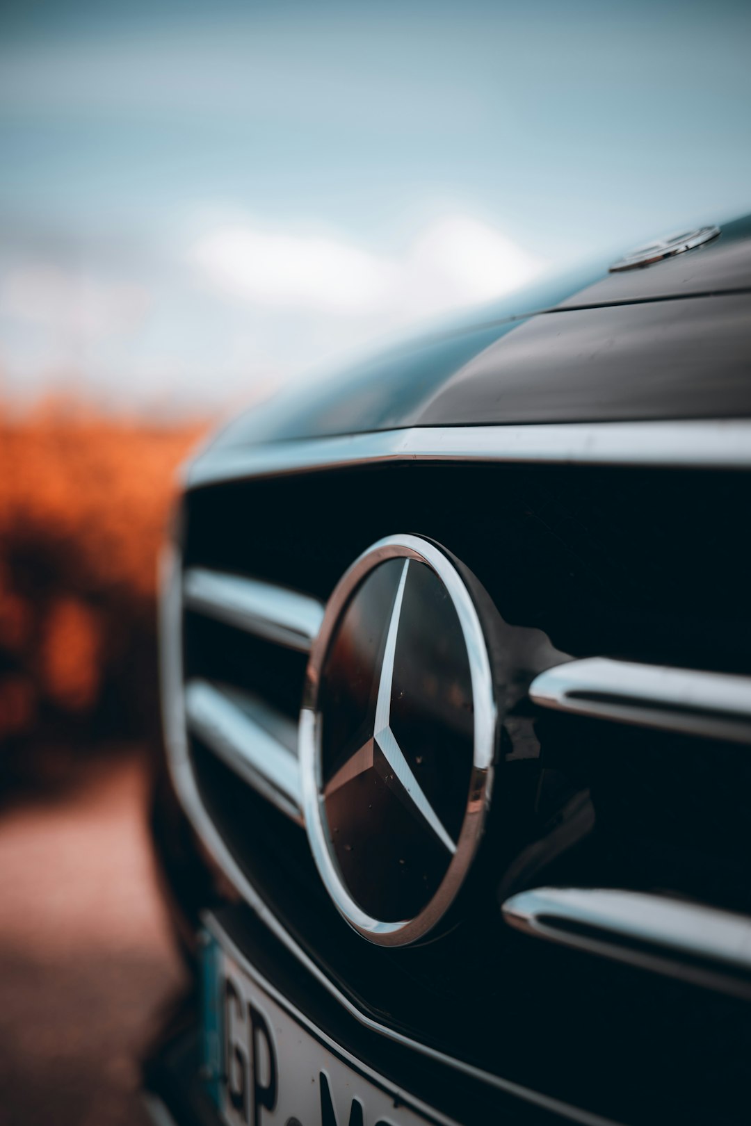 black mercedes benz car on road during daytime