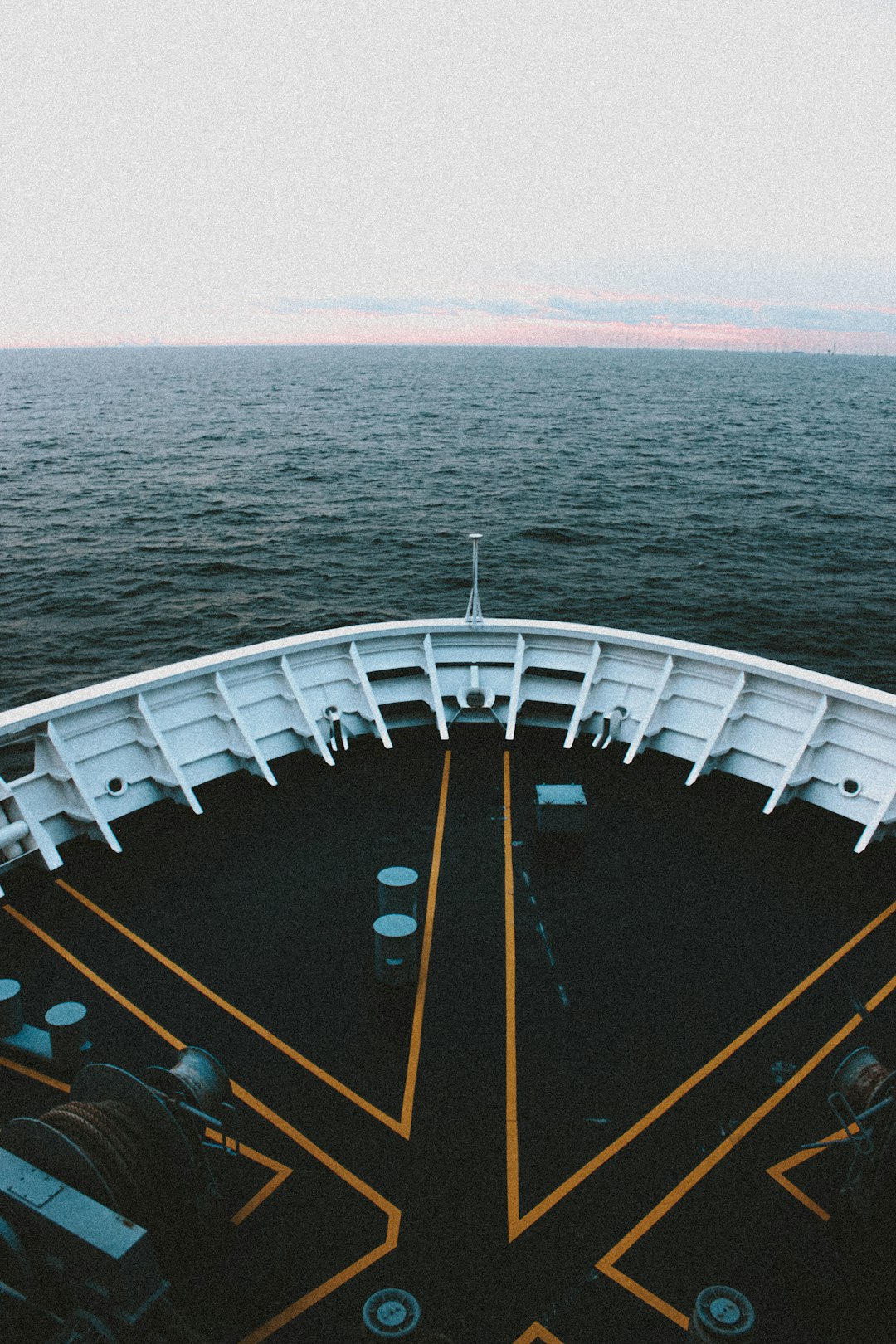 white and yellow ship on sea during daytime