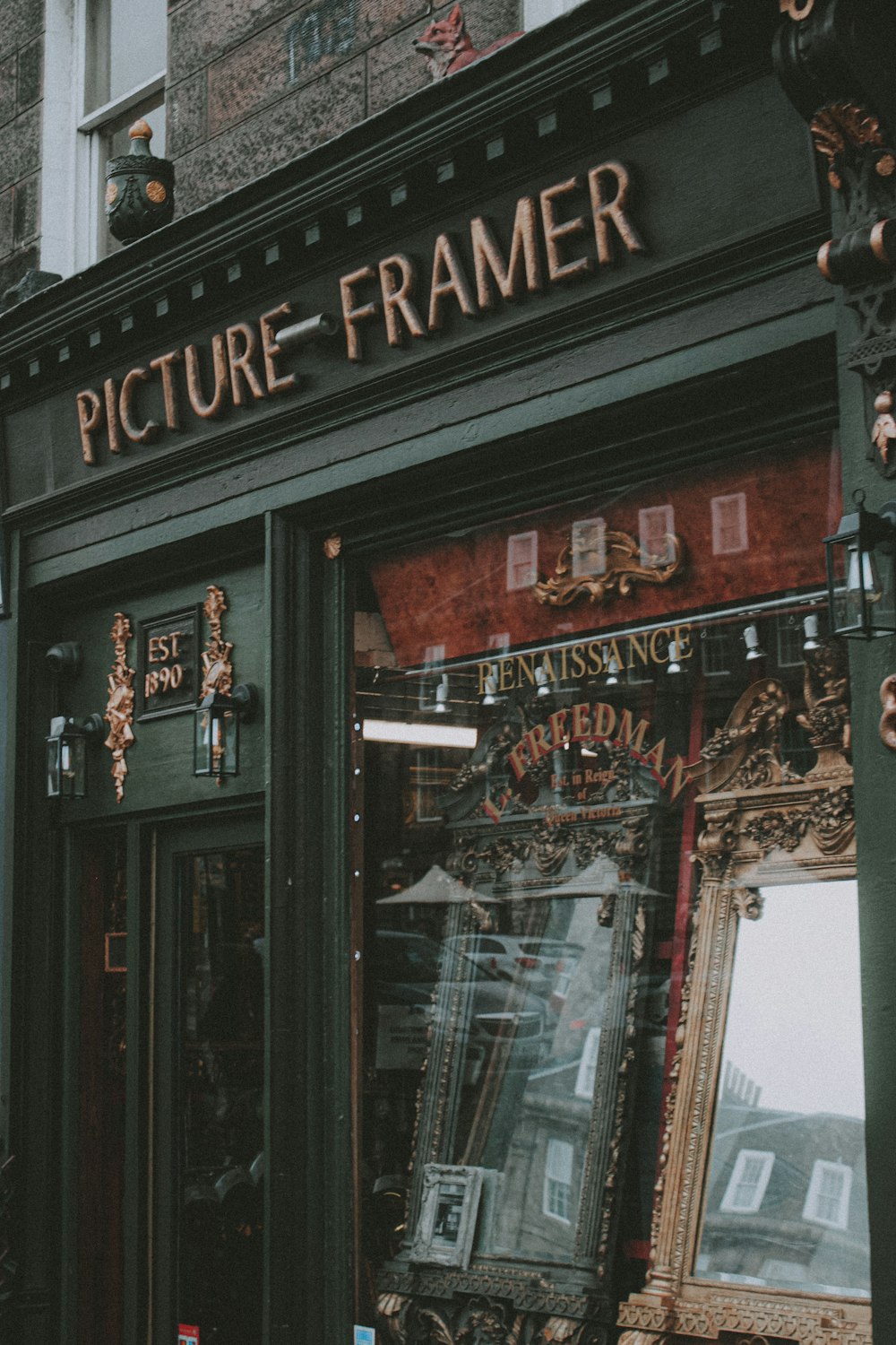 brown wooden framed glass door