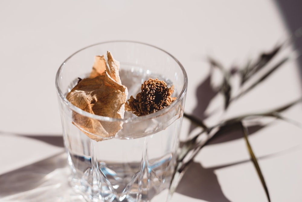 brown ice cream in clear glass cup