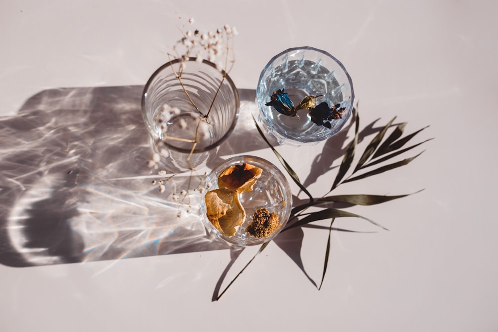 clear glass bowl with brown liquid