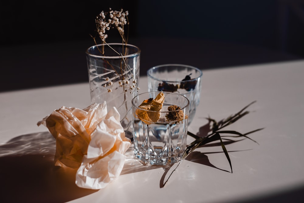 clear drinking glass with ice cubes