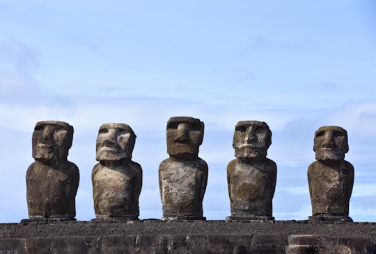 gray stone formation under blue sky during daytime in Nationalpark Rapa Nui Chile