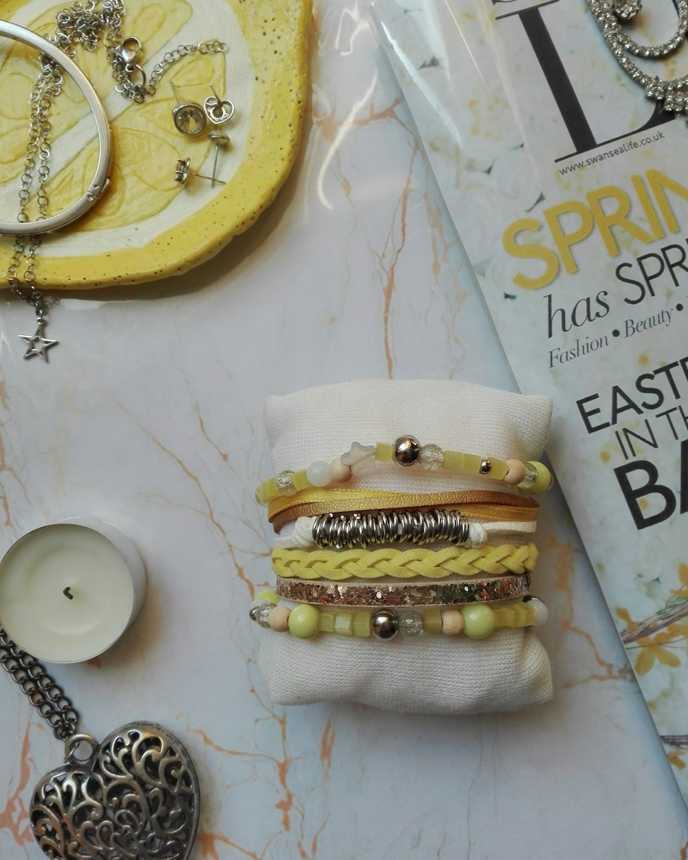 white and yellow cake on white table