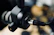 Close-up of a podcast microphone with Apple Tree Books logo in the background.