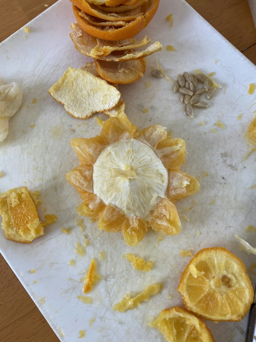 sliced lemon on white chopping board