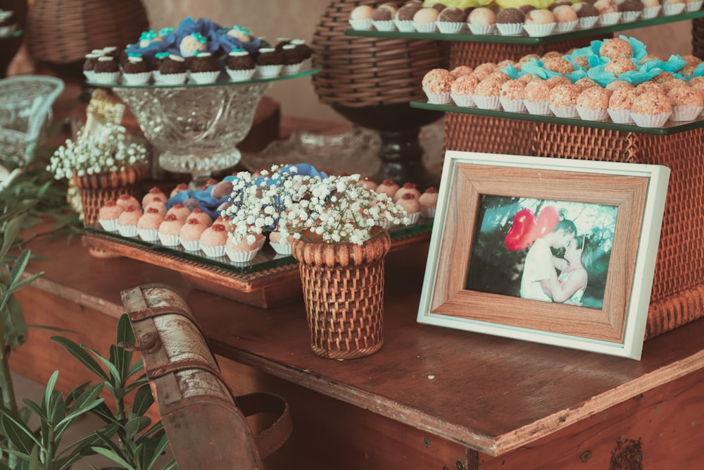 brown wooden picture frame on brown wooden table