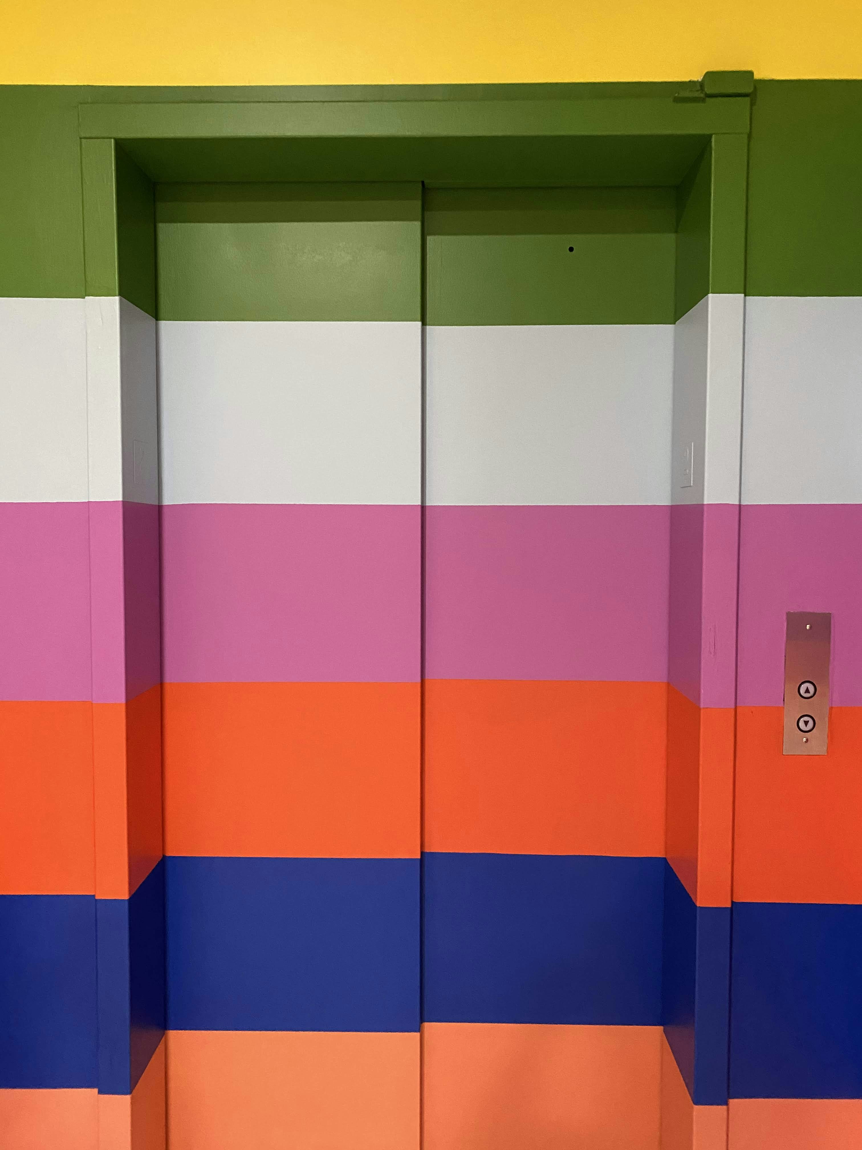 green blue and red wooden cabinet