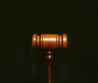 brown wooden stand with black background