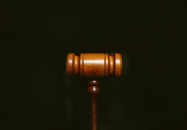 brown wooden stand with black background