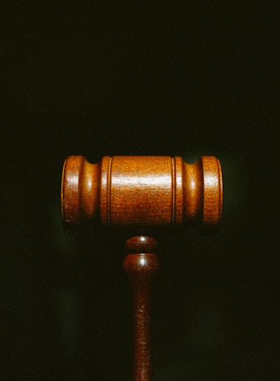 brown wooden stand with black background