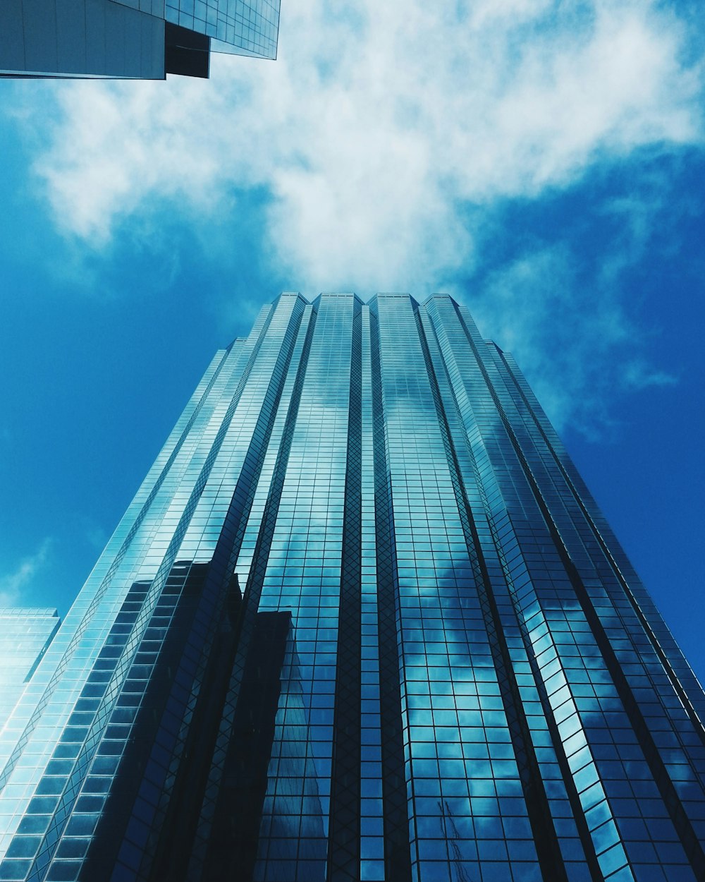 low angle photography of high rise building