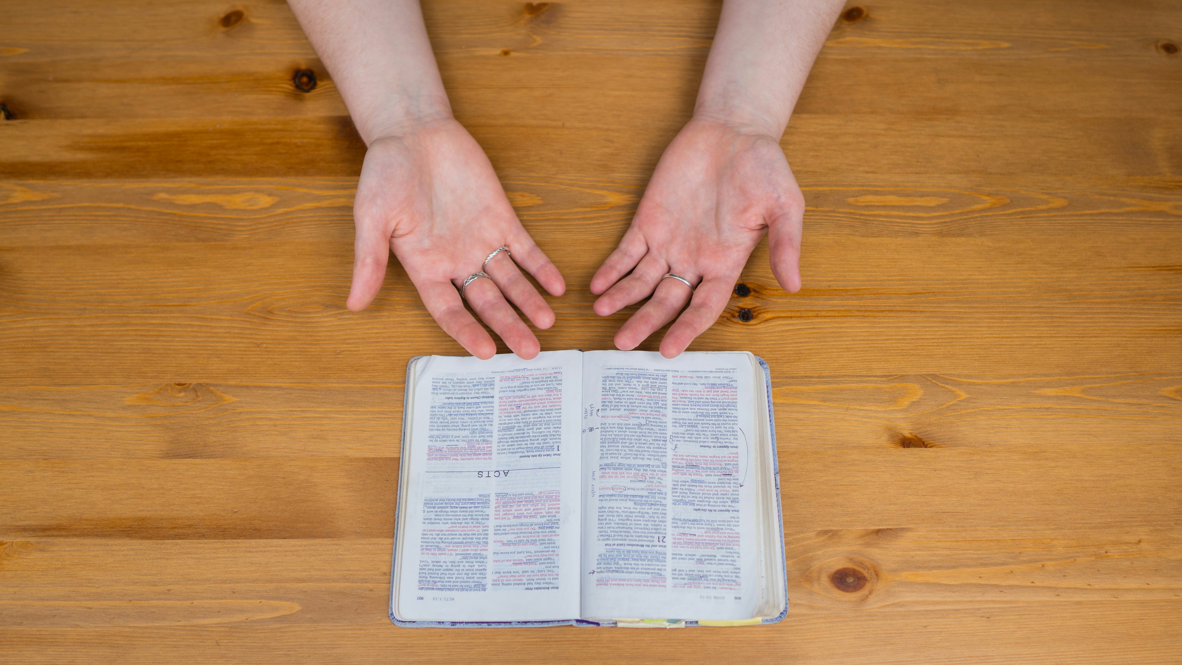 person holding white printer paper