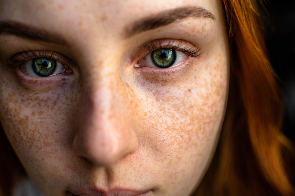 womans face with blue eyes