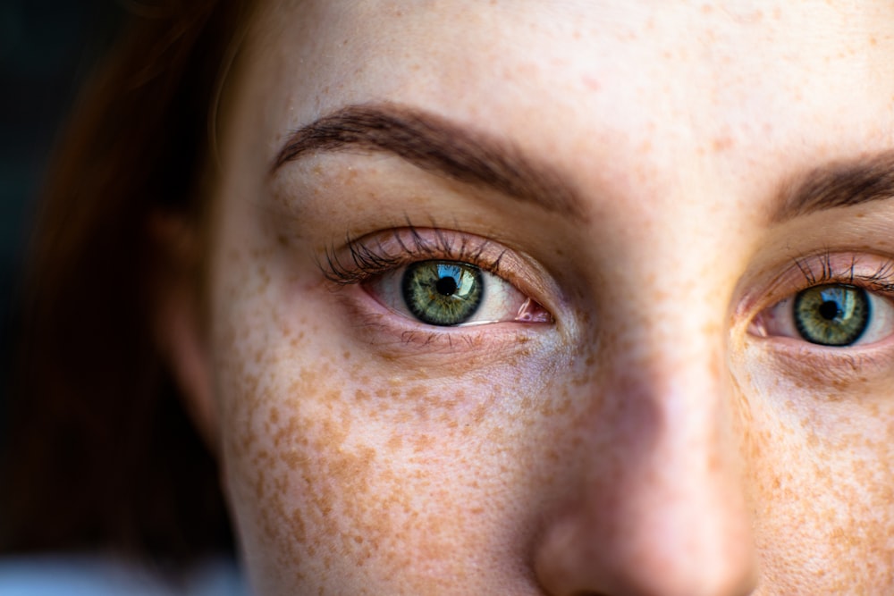 persons eye in close up photography