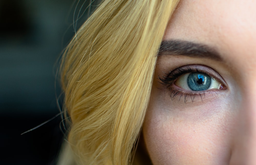 woman with blonde hair and blue eyes
