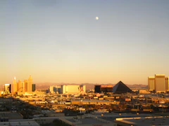 The Las Vegas skyline at sunset with hotel towers in the distance