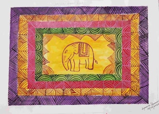 A minimalist poster featuring a stylized elephant adorned with Indian patterns against a simple background.