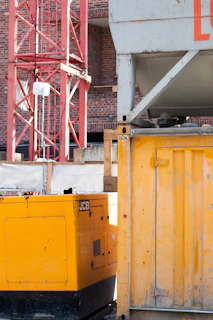 yellow and red metal industrial machine