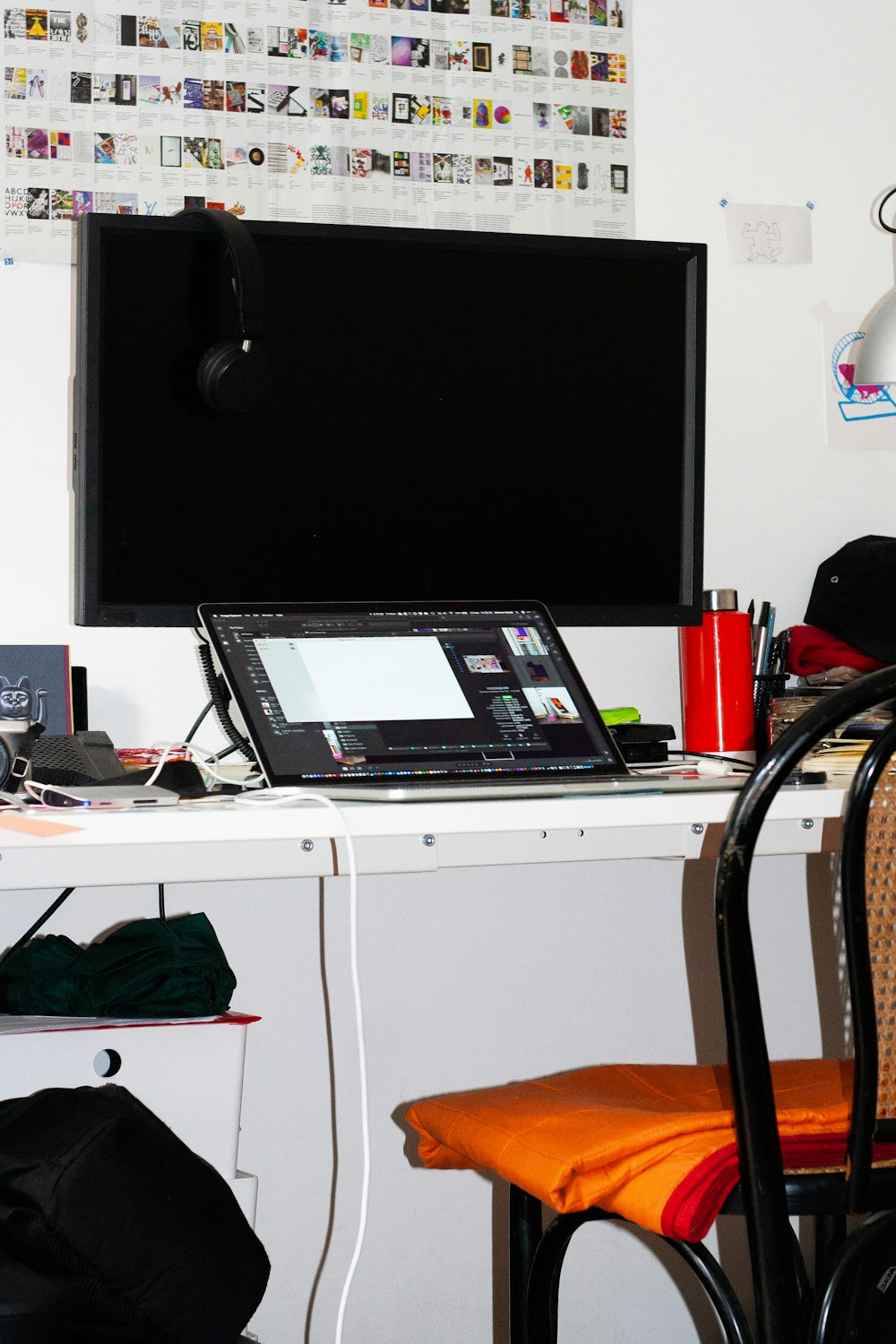 black flat screen tv on white wooden table