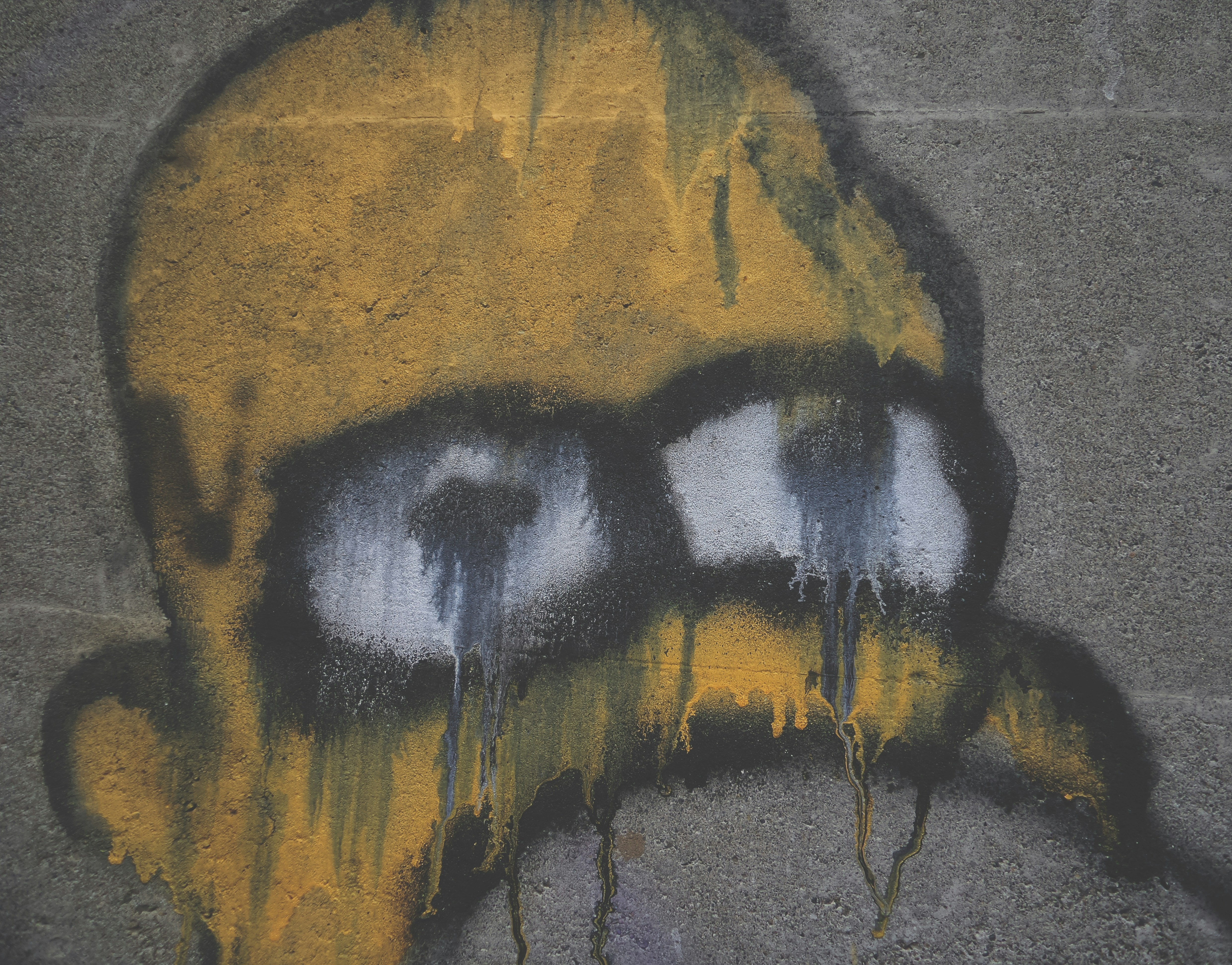 yellow and black abstract painting (Photo by Possessed Photography on Unsplash)