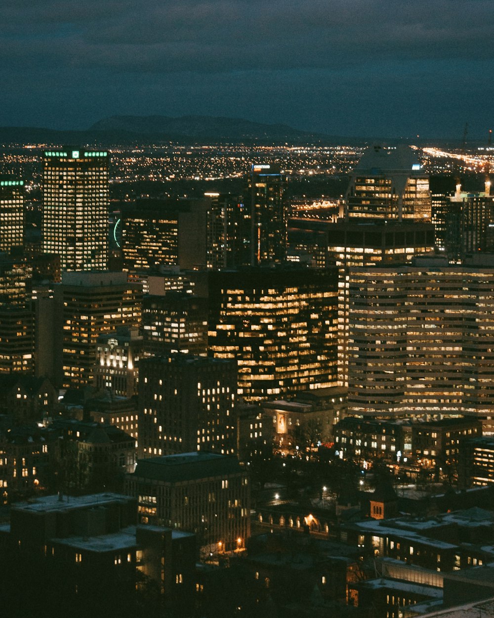 aerial view of city buildings during night time