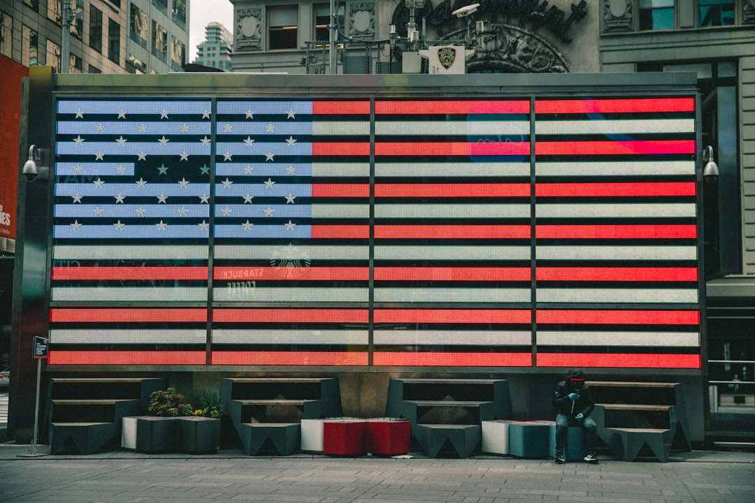 red blue and white metal fence