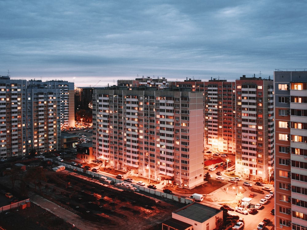 a city at night with a lot of tall buildings