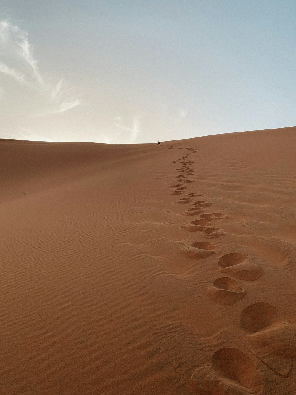 brown sand under blue sky during daytime