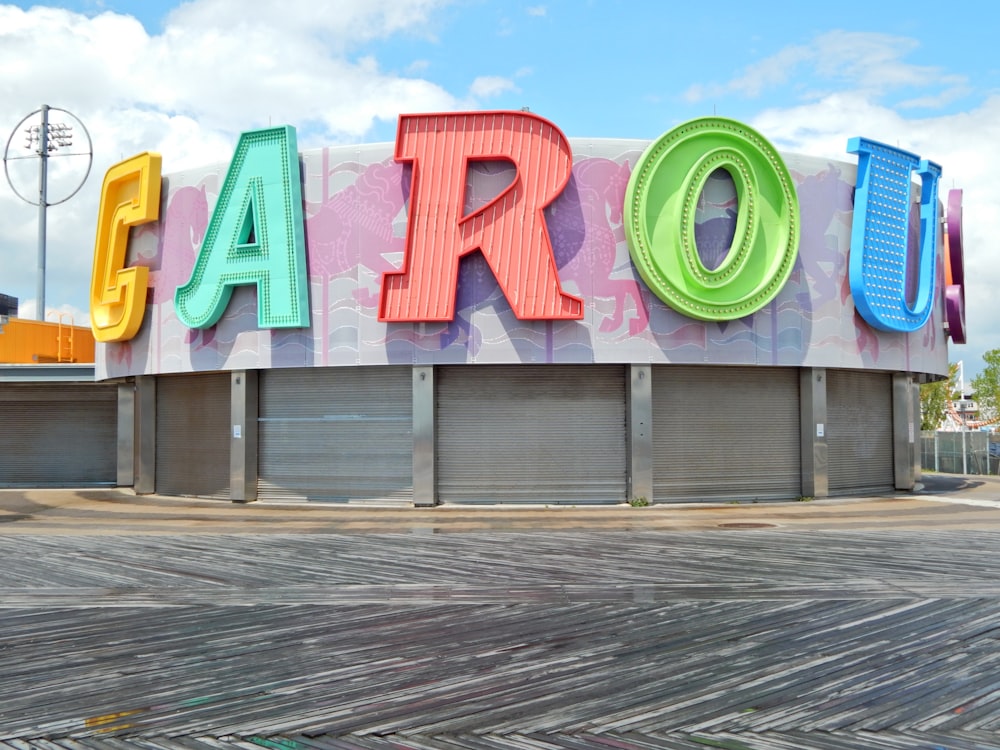 a large sign that says farol on the side of a building